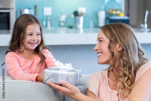 Daughter surprising mother with gift