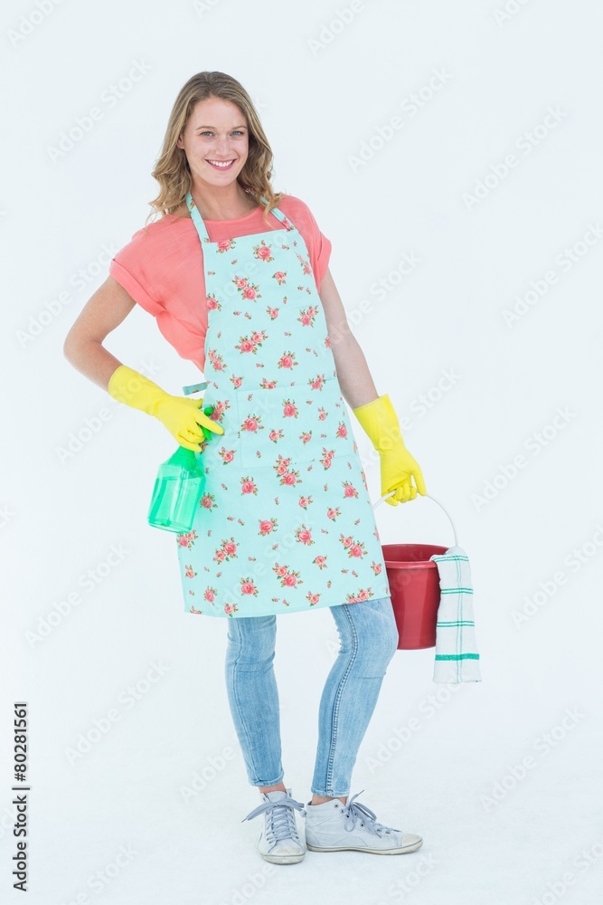Woman wearing protective gloves and holding bucket Woman wearing protective gloves and holding bucket