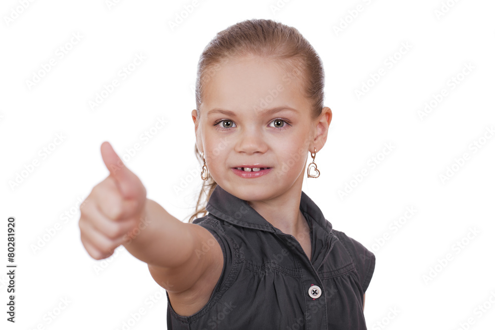 Little girl is showing thumb up gesture using both hand Little girl is showing thumb up gesture using both hand