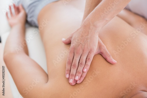 Physiotherapist doing back massage to her patient © WavebreakmediaMicro