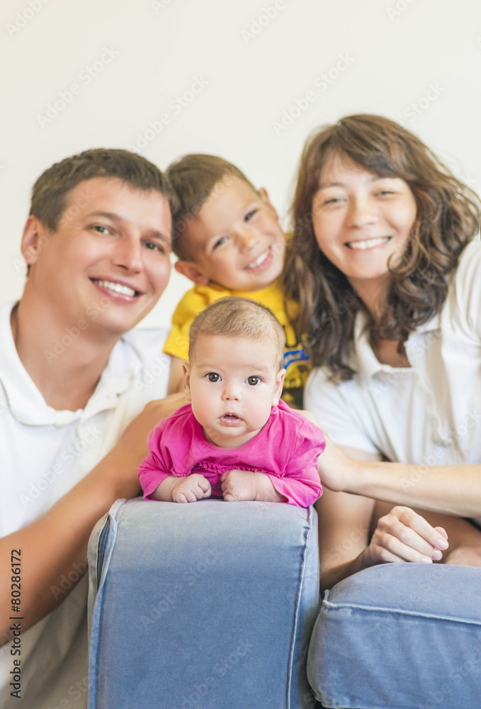 Family Concept: Natural Portrait of Happy Caucasian Family Get T Family Concept: Natural Portrait of Happy Caucasian Family Get T