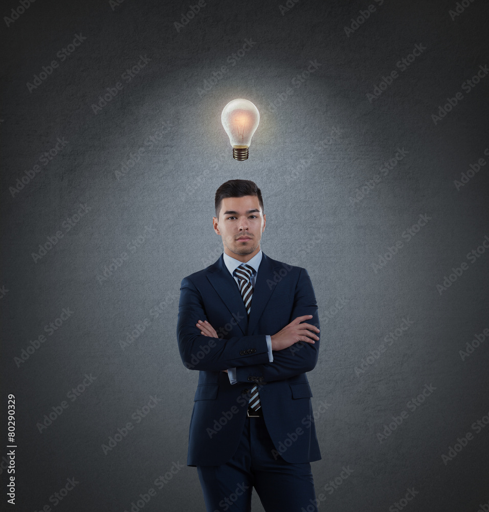 Business man with idea light bulb above head Business man with idea light bulb above head