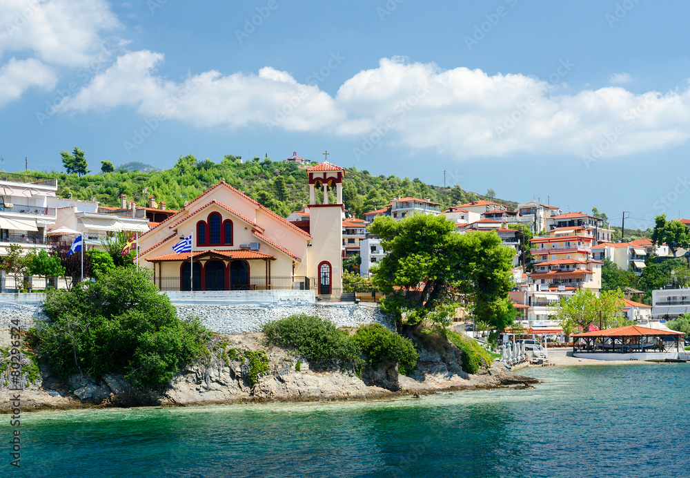 Greece, Sithonia, view of church on waterfront in Neos Marmaras