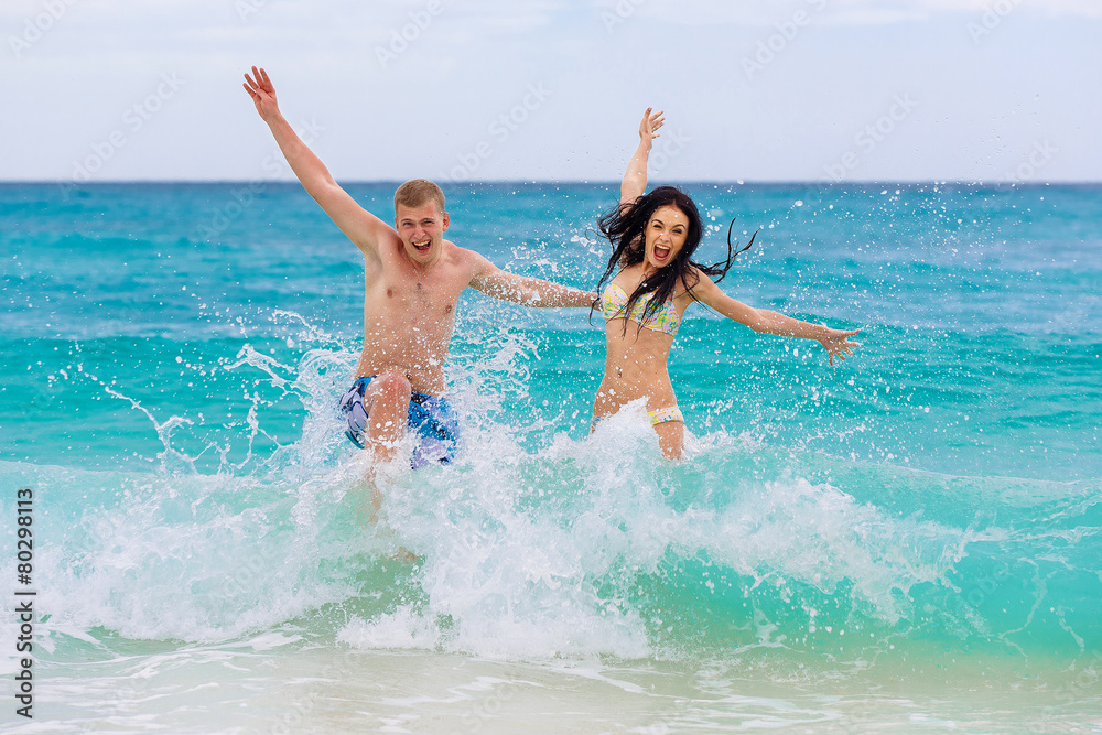 young loving happy couple on tropical beach young loving happy couple on tropical beach