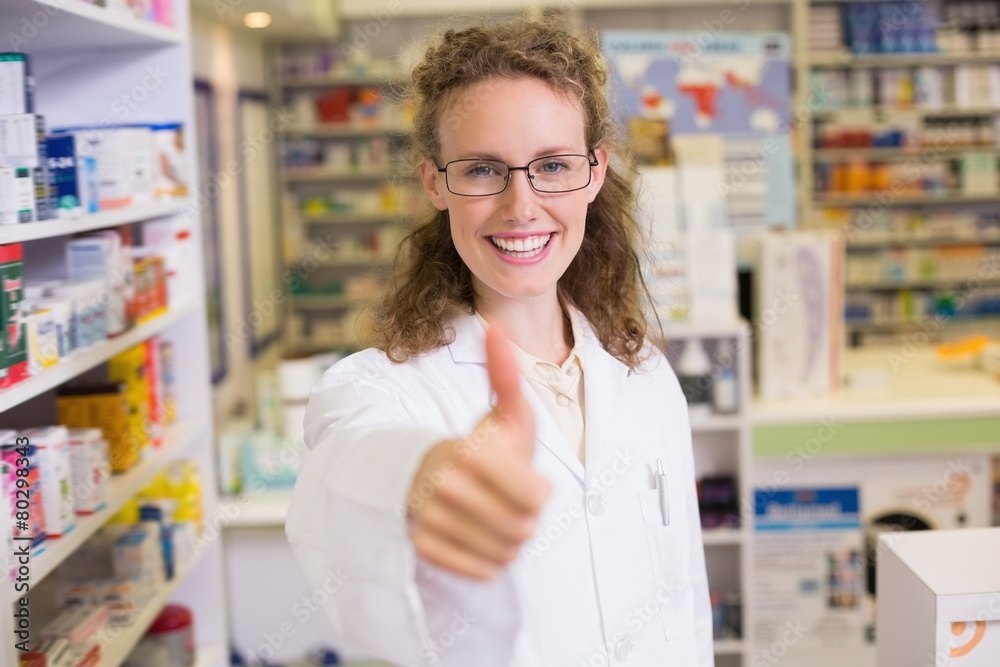 Pharmacist holding her thumb up