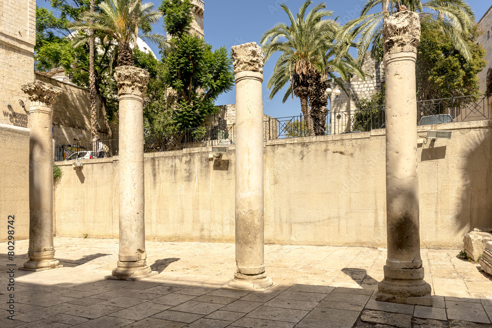 Fototapeta premium narrow streets of old Jerusalem. Stone houses and arches