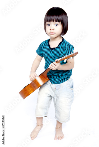 Cute Boy Playing Ukulele Guitar