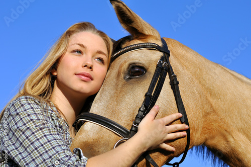 portrait of teenage girl and horse