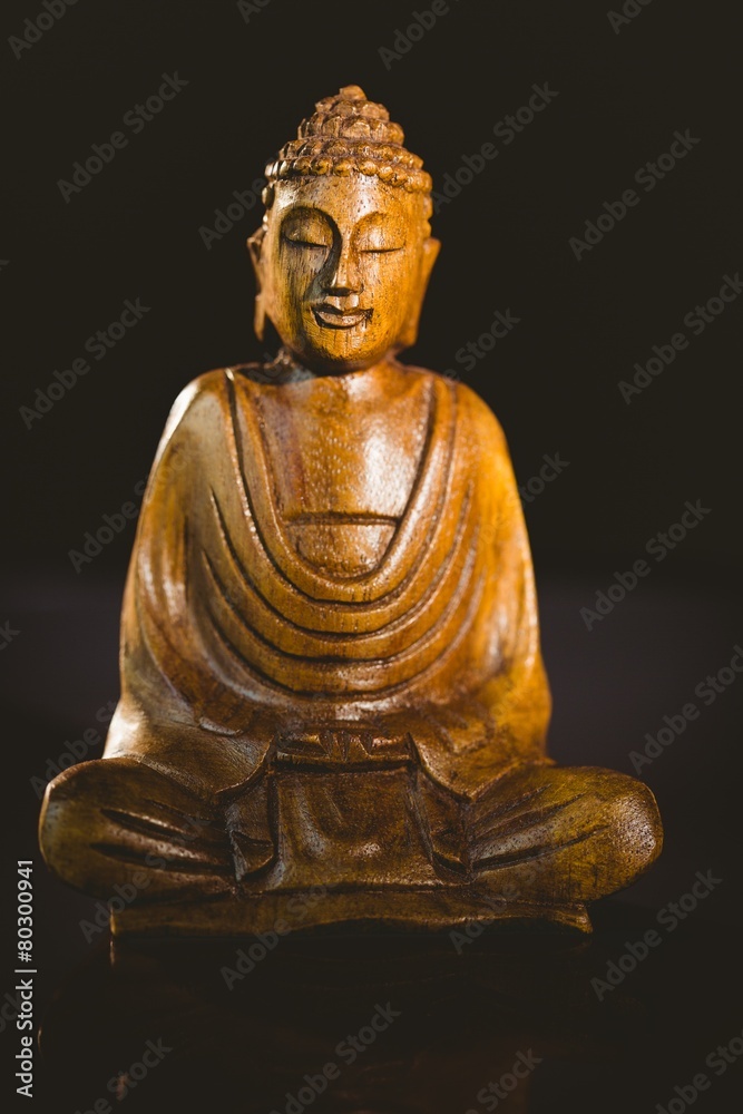 Fototapeta premium Wooden buddha statue
