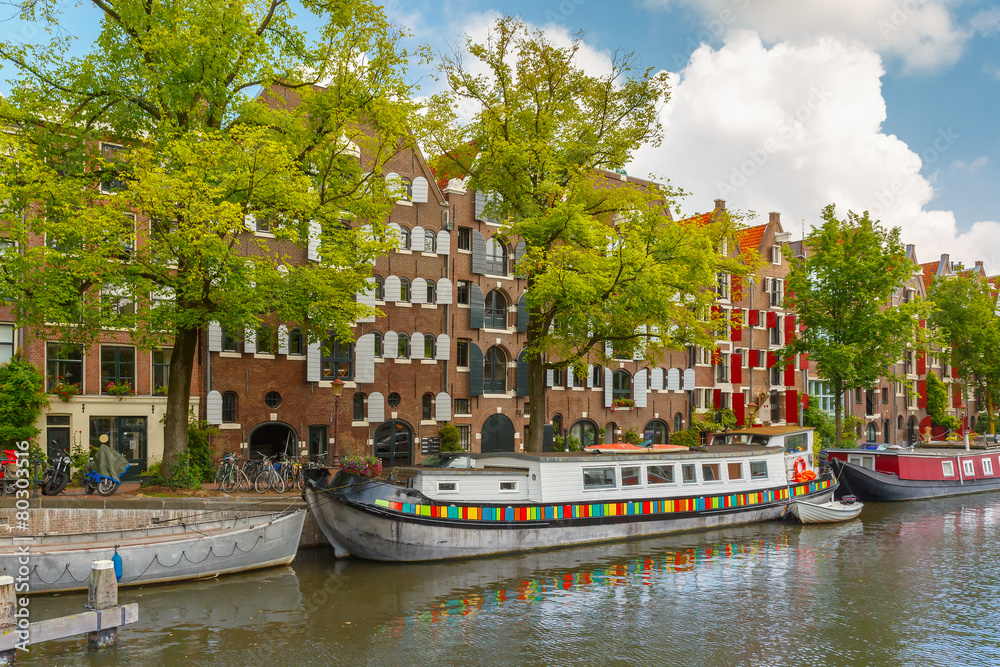Amsterdam canal with picturesque houseboats, Holland