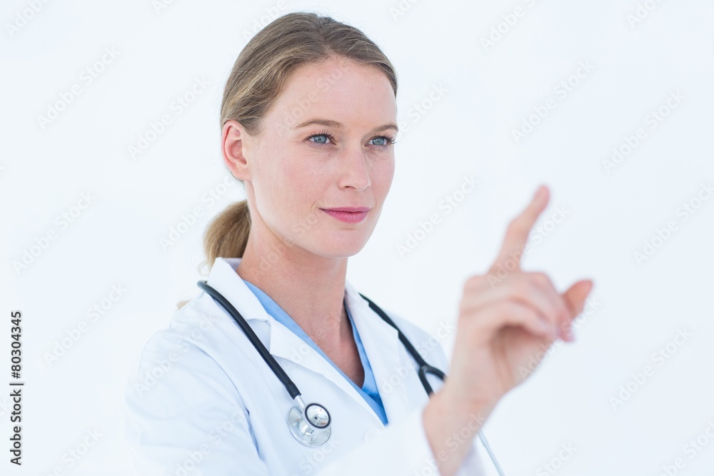 Young doctor pointing Young doctor pointing