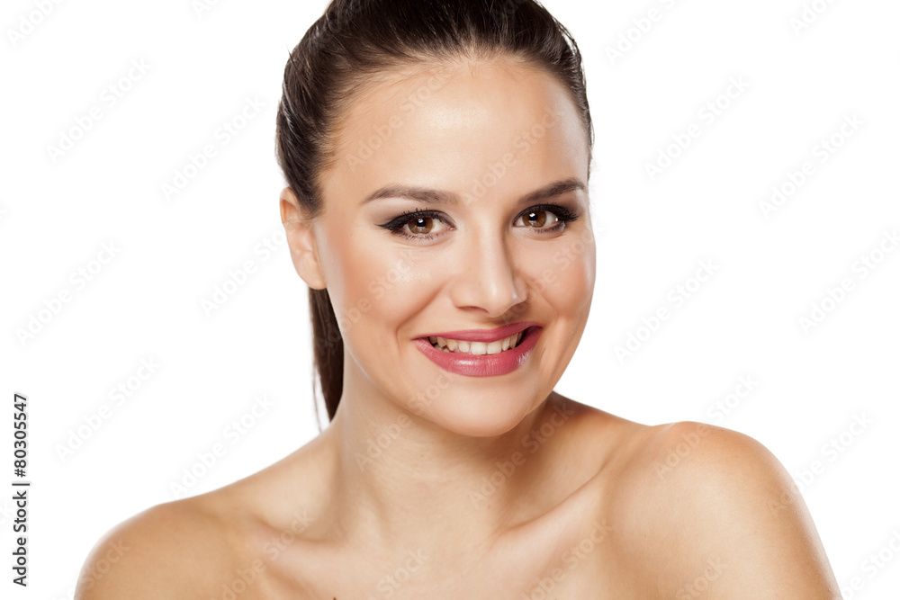 Smiling young beautiful woman looking at camera Smiling young beautiful woman looking at camera