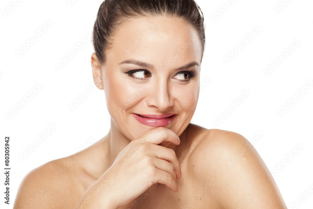 happy seductive young woman leaning on her hand happy seductive young woman leaning on her hand