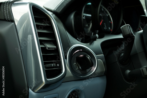 Modern car air conditioning system. Auto interior detail. © alexdemeshko