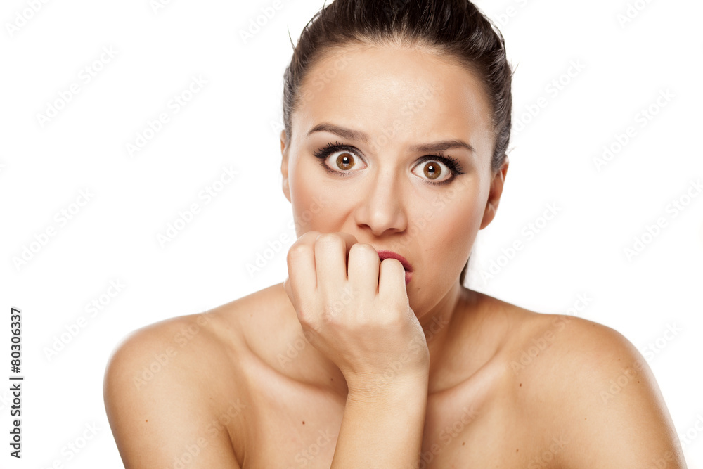 portrait of concerned and scared young woman portrait of concerned and scared young woman