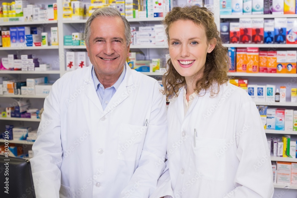 Pharmacists looking at the camera