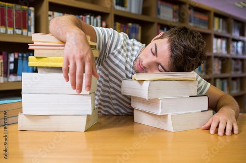 Bilde på lerret Student asleep in the library