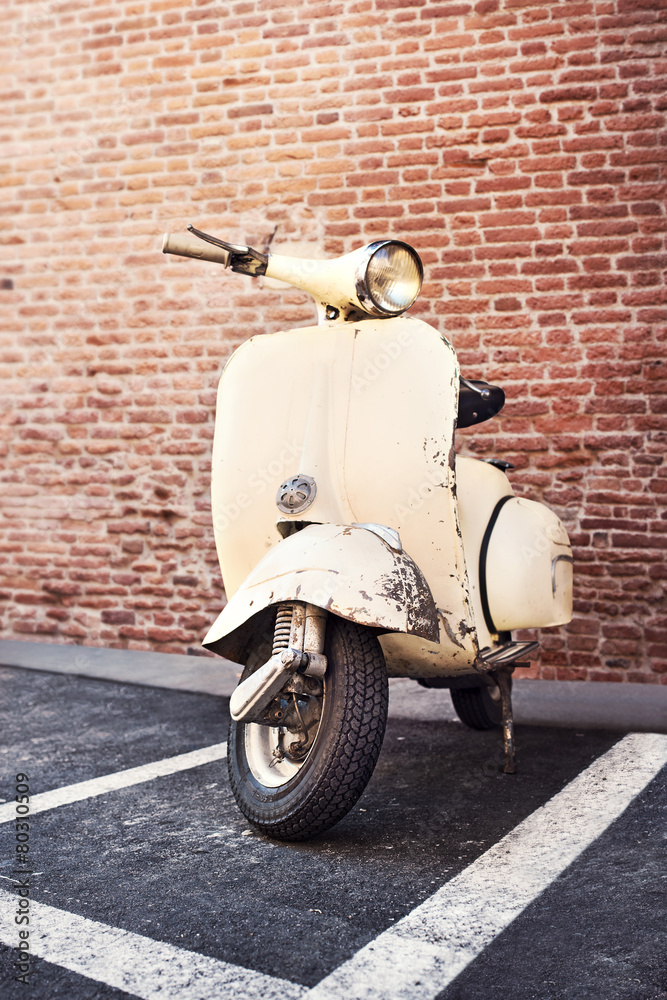 Italian Vespa motorcycle Parked on the street