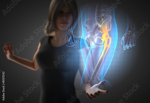 woman and hologram with hip radiography