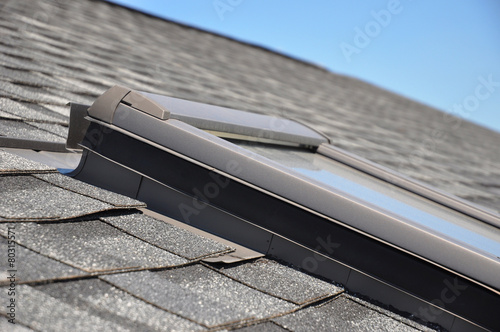 Foto Roof window with closeup waterproofing areas.