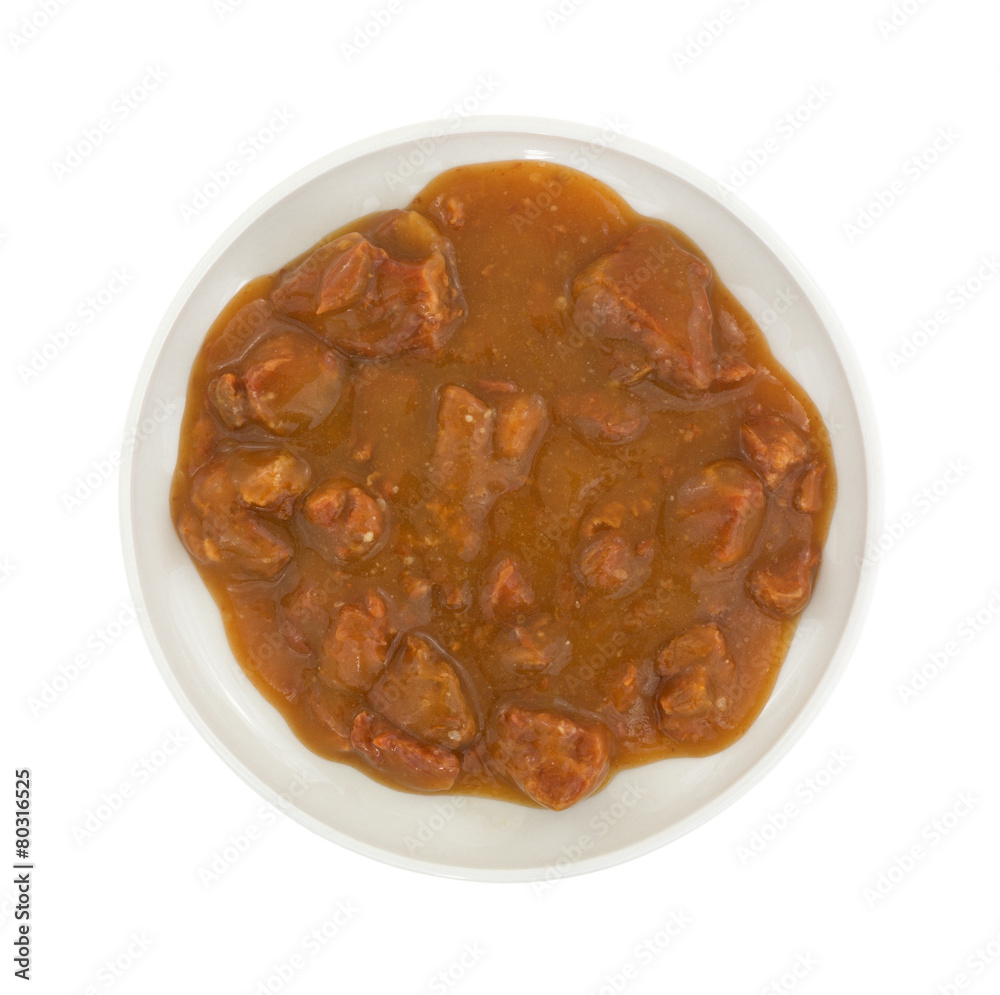 Roast beef in gravy on small plate Roast beef in gravy on small plate