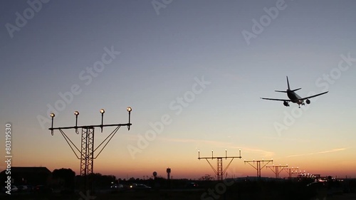 Airport lights and plane landing
