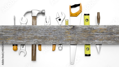Various tools and wood with copy space, isolated on white photo