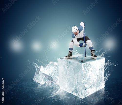 Obraz na plátně Hockey player on the ice Cube - face-off moment