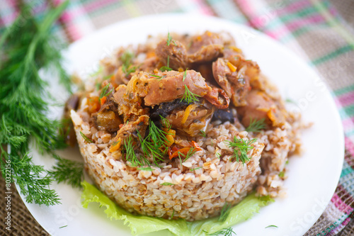 Boiled buckwheat with stewed chicken gizzards