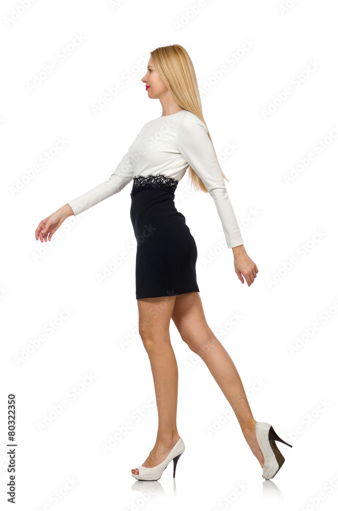 Pretty woman in black and white dress isolated on white Pretty woman in black and white dress isolated on white