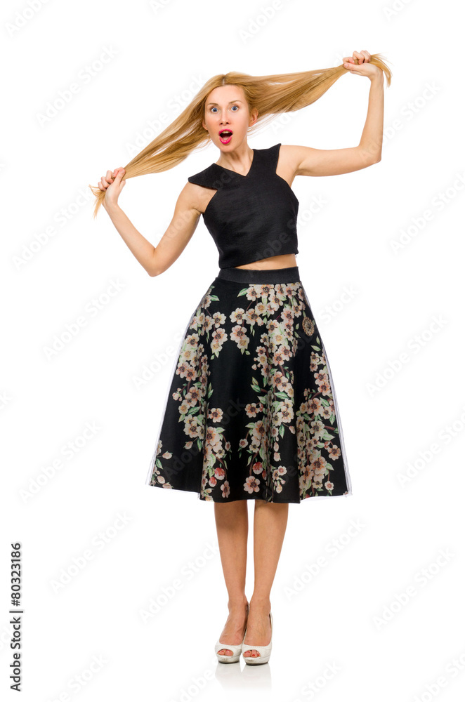 Woman in floral dark skirt isolated on white Woman in floral dark skirt isolated on white