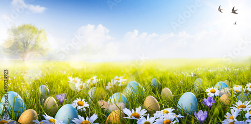art Colorful Easter eggs decorated with flowers in the grass on