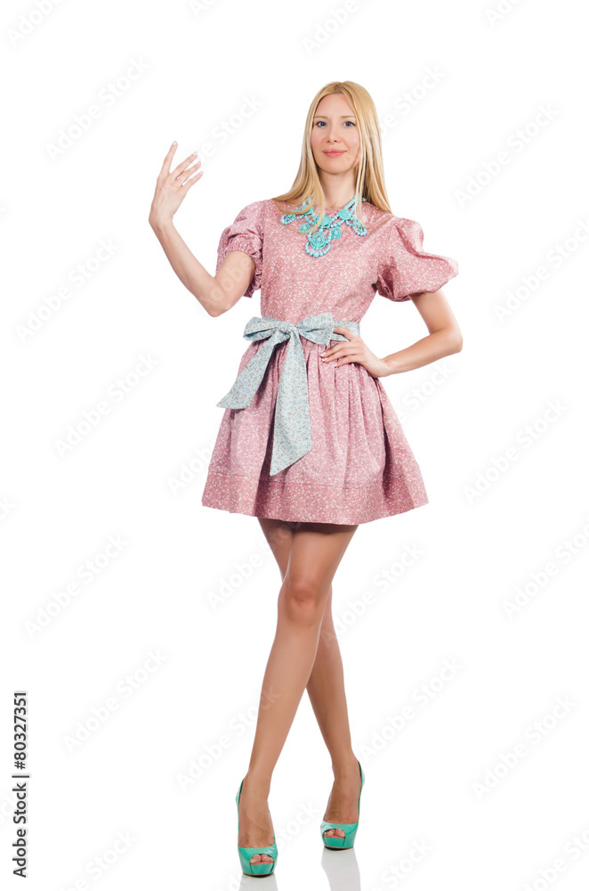 Woman in pink doll dress isolated on white