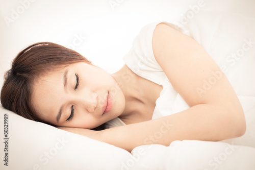 beautiful girl sleeps in the bedroom