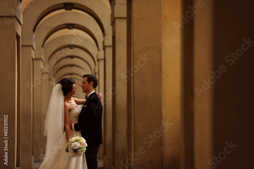 groom and bride in a hallway