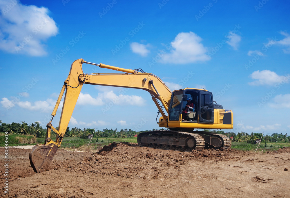 Excavator working at construction site Excavator working at construction site