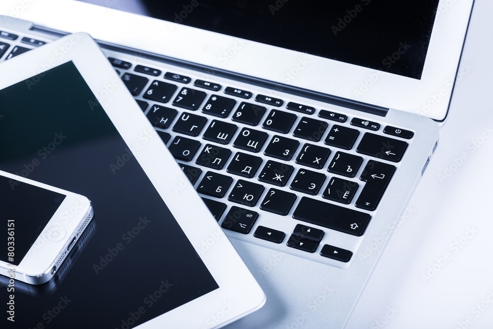 Technology. Closeup picture of a keyboard with a phone and Technology. Closeup picture of a keyboard with a phone and