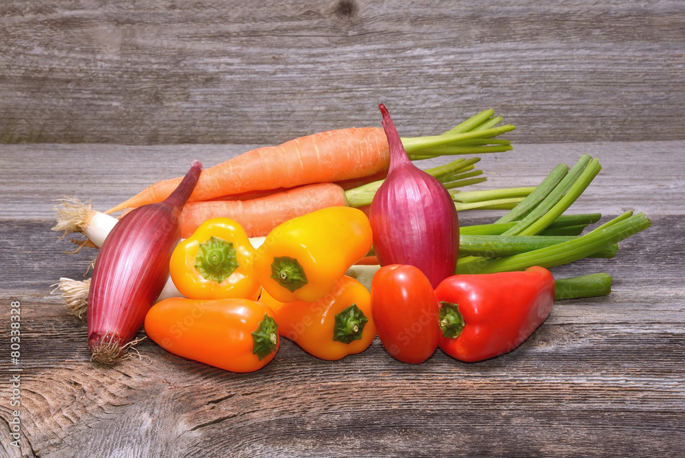 Vegetables on old wooden background