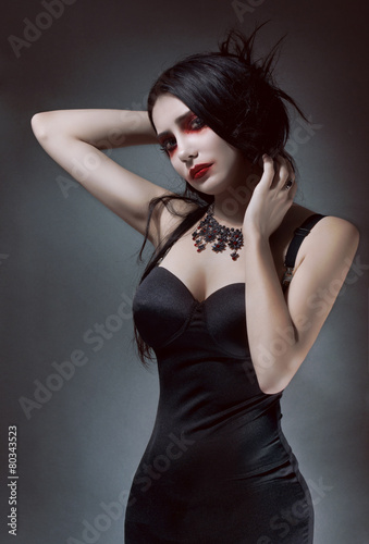 Pretty brunnete woman in black dress