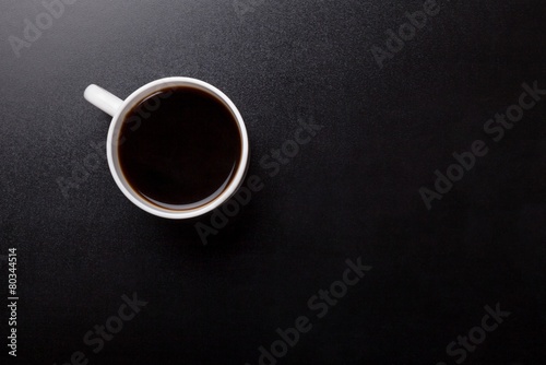 Above. Coffee Mug on Wooden Table photo