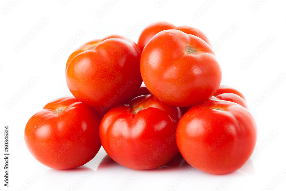 Fresh tomatoes isolated on white. Closeup of tomatoes Fresh tomatoes isolated on white. Closeup of tomatoes