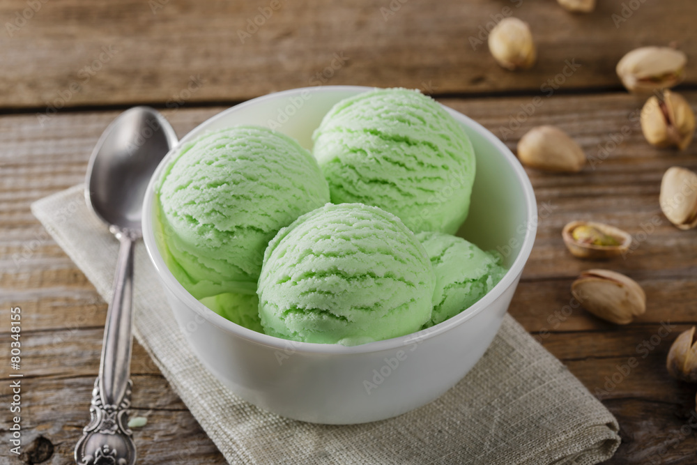 pistachio ice cream in a bowl the ball pistachio ice cream in a bowl the ball