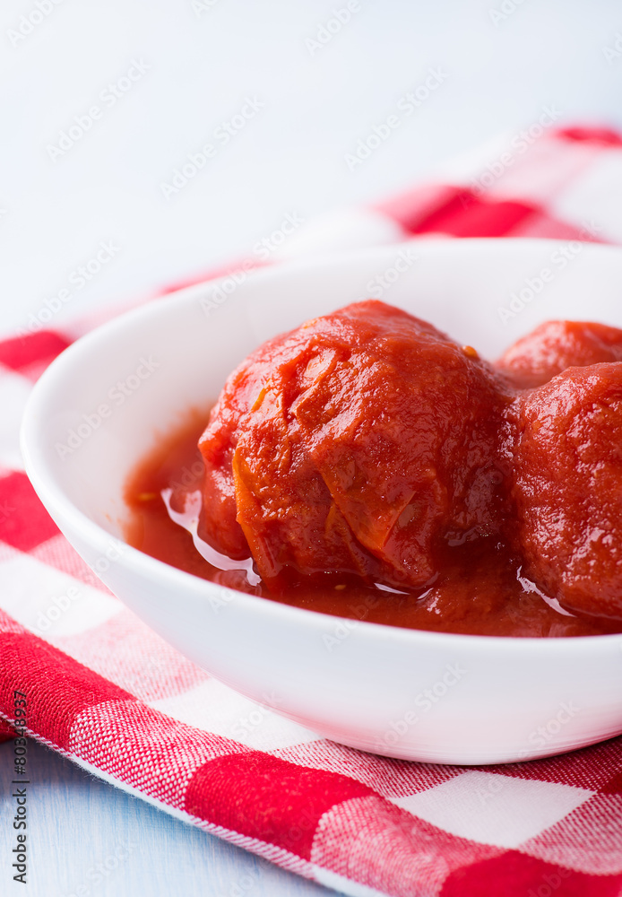 Canned tomatoes in bowl Canned tomatoes in bowl