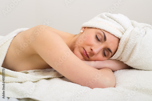 young woman enjoying a spa day out.