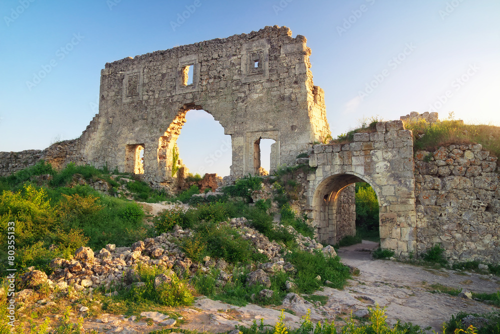 Old citadel ruins on sky background. Mangup Kale, Crimea