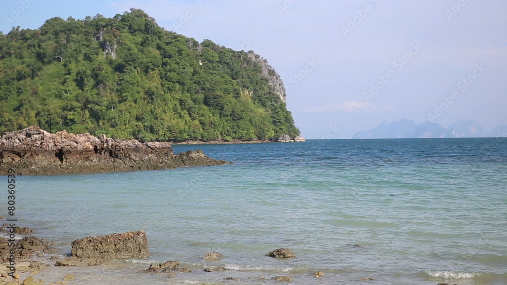 view of cliff tropic islands in azure sea in Thailand view of cliff tropic islands in azure sea in Thailand