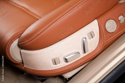Passenger seats in modern  comfortable car, close up photo © Maksim Kostenko