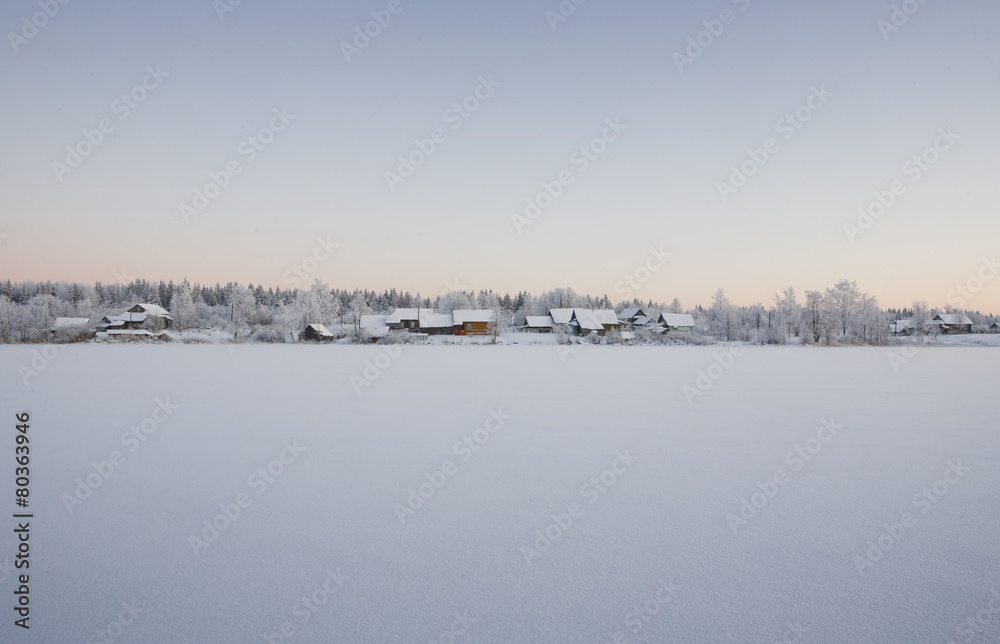 Fototapeta premium Winter landscape in russian village