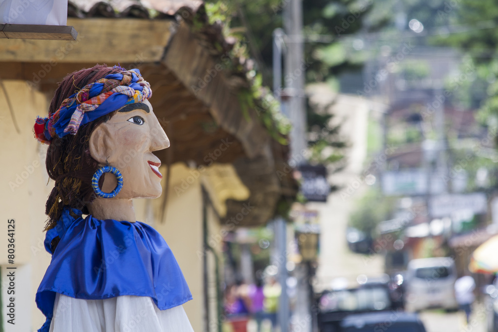 Side view of a giant doll in Ataco, El Salvador