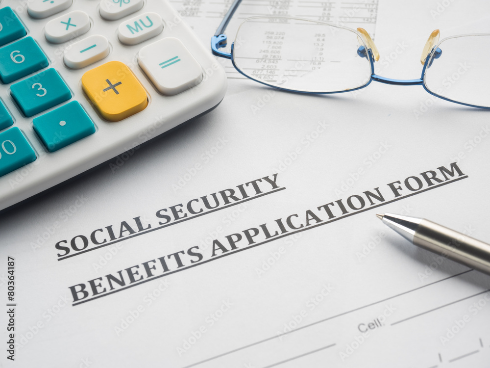 social security benefits application form on the desk.